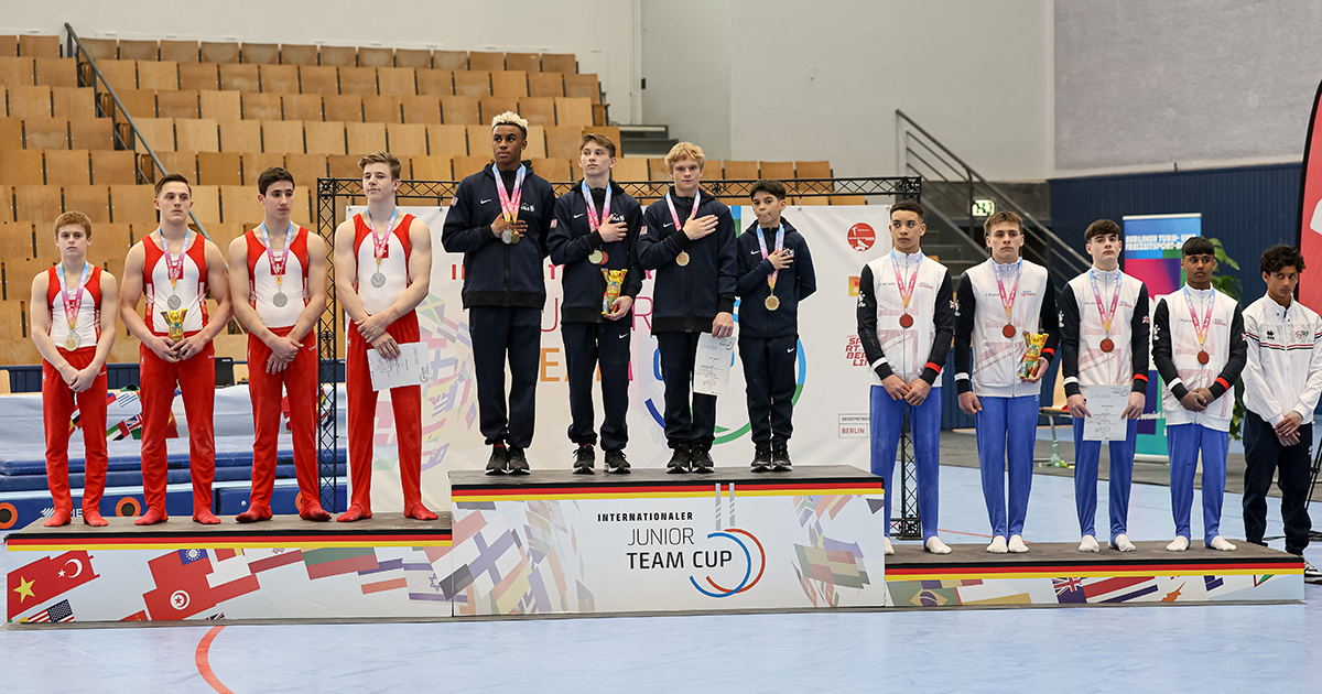 Photo: Victory Ceremony for the teams in All Around Competition. 1st Place: USA, 2nd Place: Switzerland, 3rd Place: Great Britain