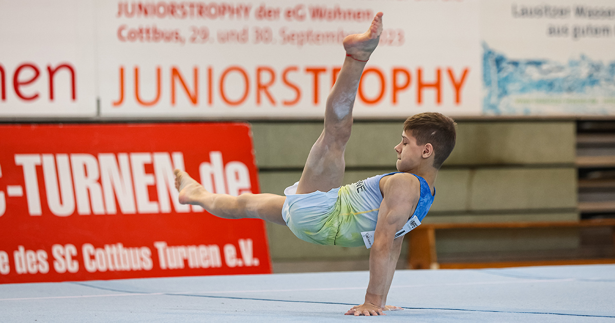 Photo: Volodymyr Golovin (UKR) shows his exercise in All-Around competition on the Floor